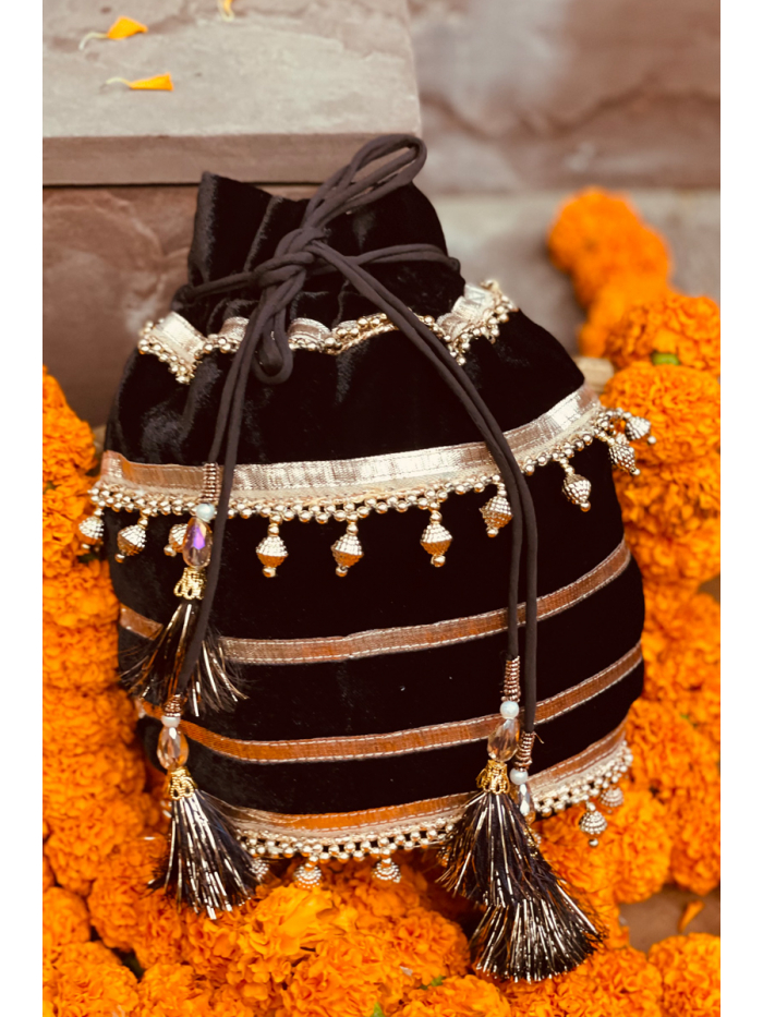 Buy Black Embroidered Handcrafted Potli Bag by AMYRA Online at Aza Fashions.