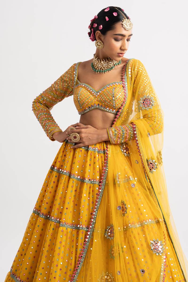 Yellow Noodle Strap Multi Tier Lehenga Set Design by Vvani by Vani Vats ...