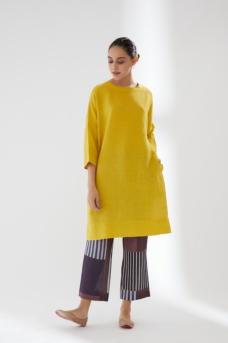 Yellow tunic set with contrast troussers Design by Brih at Modvey | Modvey